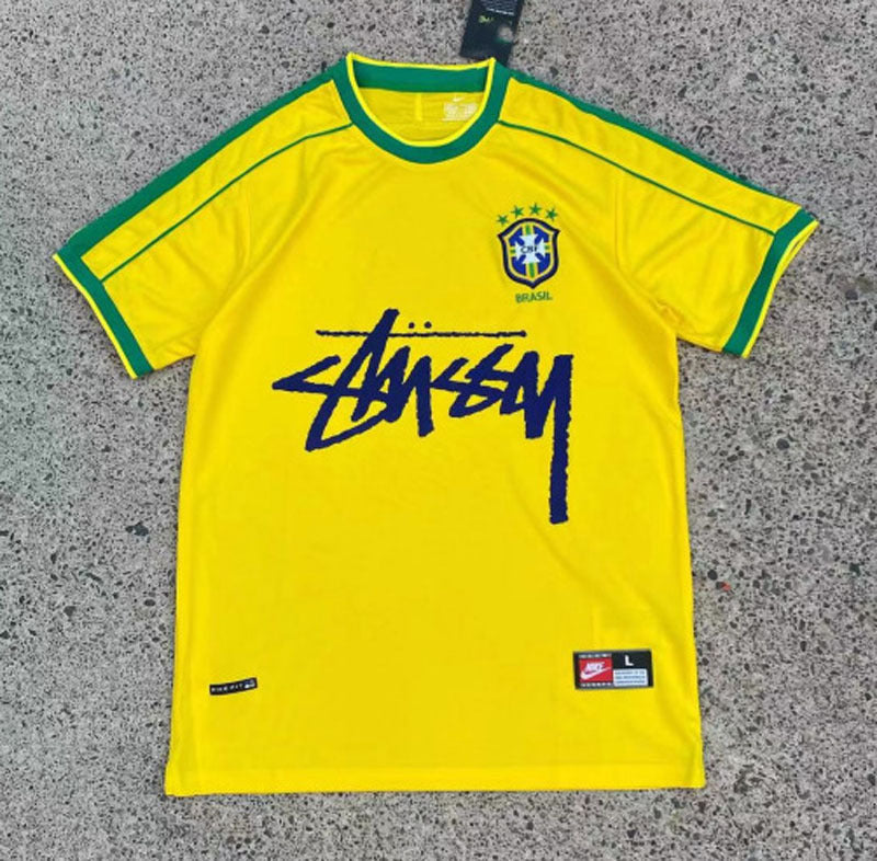 GEEL - BRASIL X STUSSY JERSEY